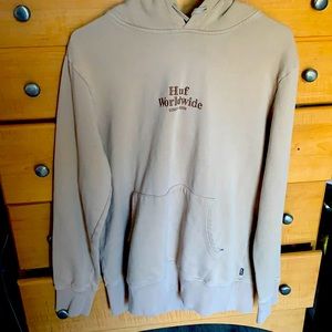 A tan HUF Hoodie